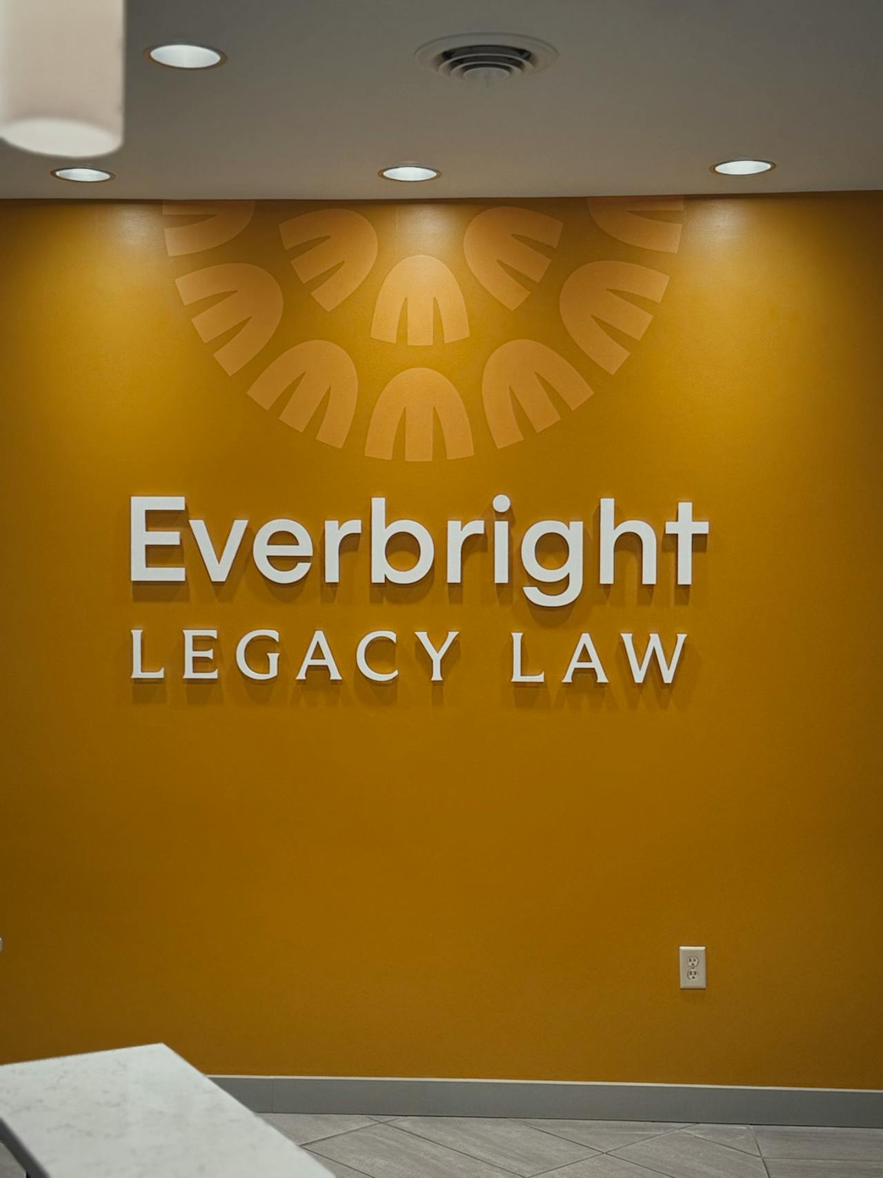 Sign day at Everbright Legacy Law: Lobby wall